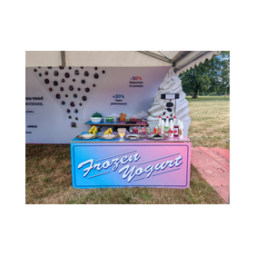 hire a frozen yogurt bar with an attendant for corporate festival fun day. frozen yogurt catering services for company office summer party, rent a foyo bar.